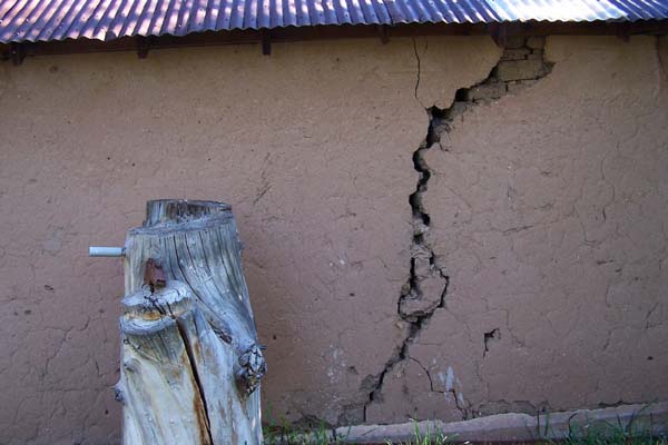 large crack in the adobe wall