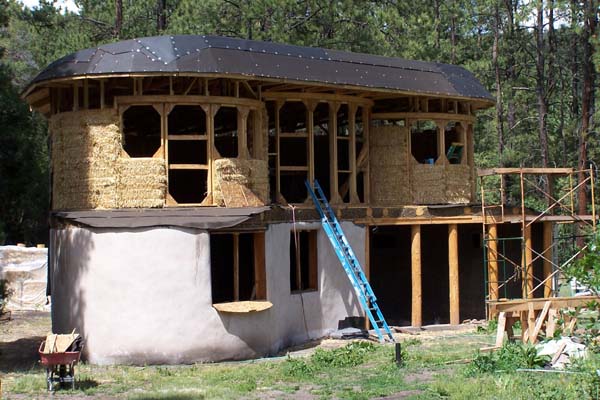 2 story curved straw bale walls