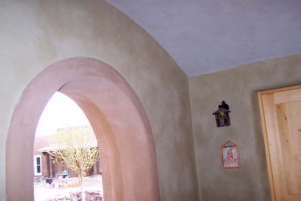 green plaster white arched ceiling