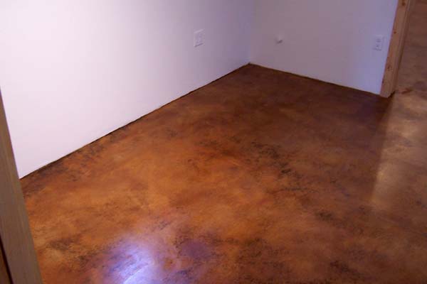Copper colored acid stained cement floor