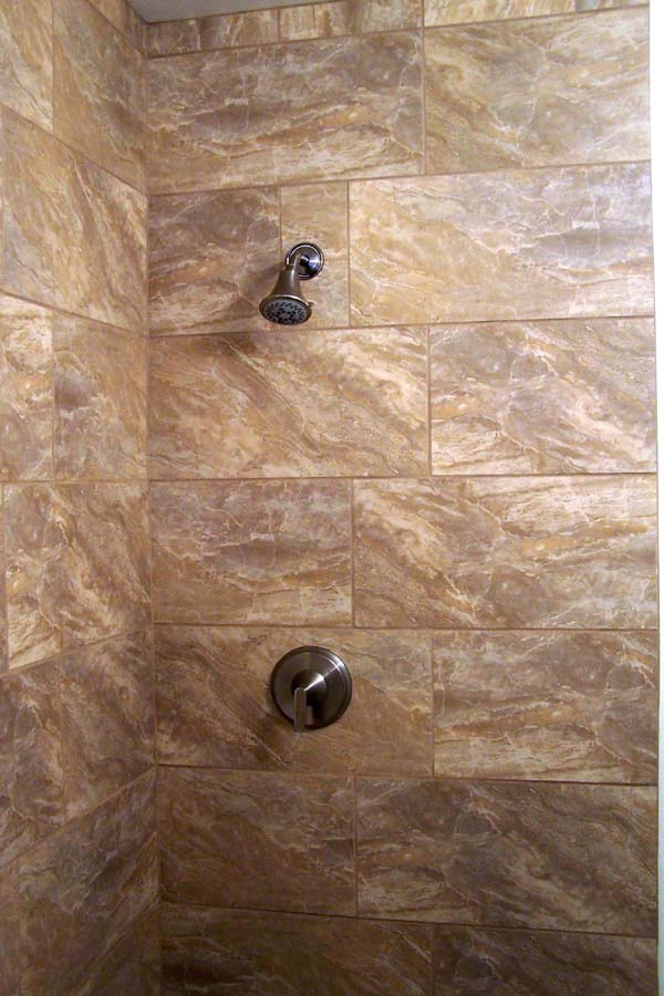 tan over sized tiles for shower stall