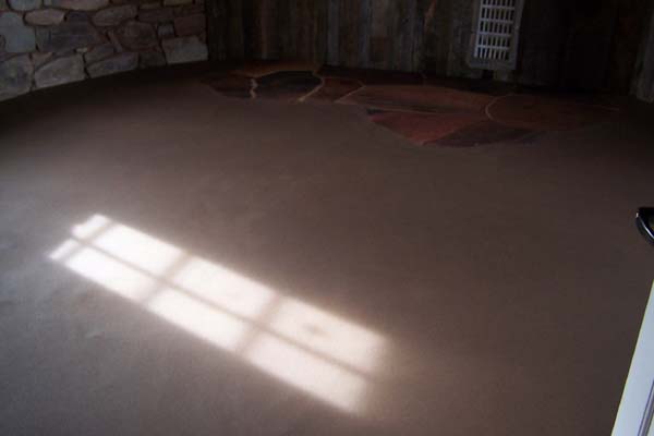 earthen floor with flagstone inlay