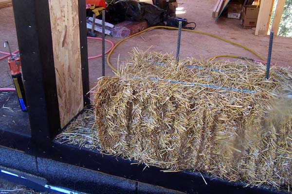 straw bales walls begin