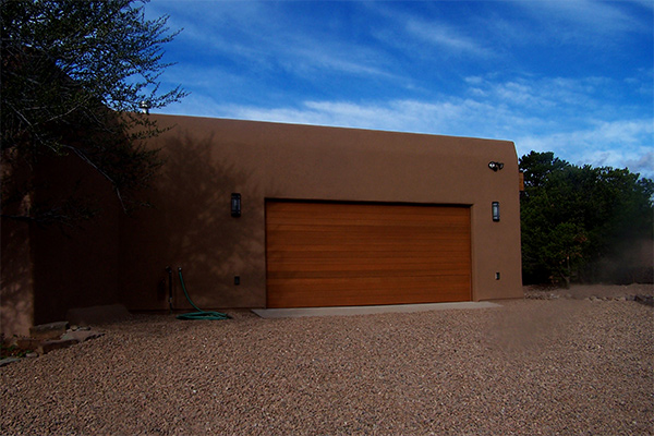 new garage front on 1970s adobe home