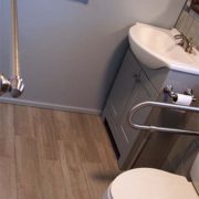 grey tiled bathroom floor
